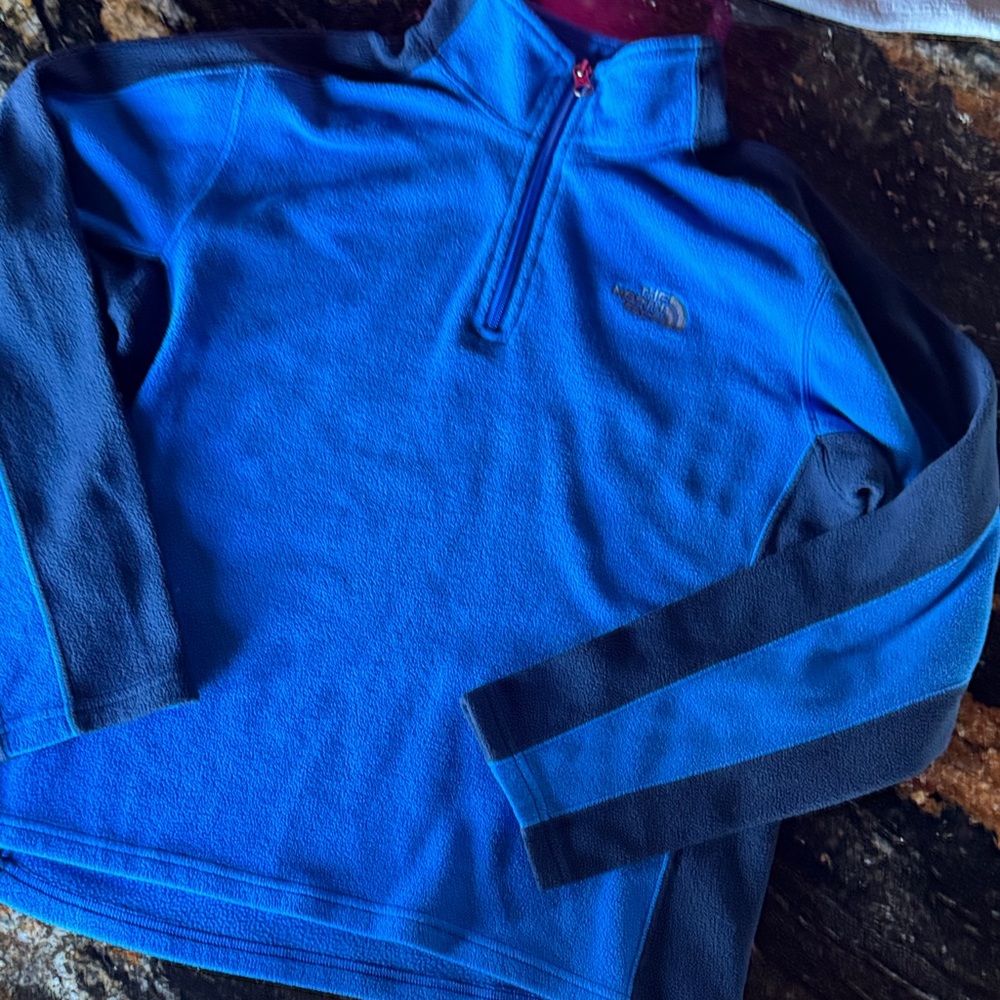 The North Face boys youth large fleece quarter zip pullover; blue and navy blue.